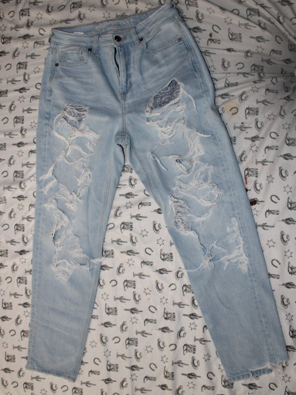 American Eagle light wash ripped mom jeans